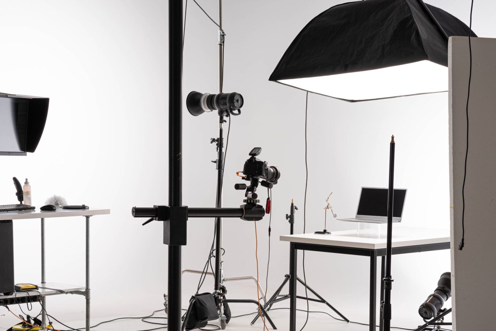 Professional studio setup with cameras and lighting for product photography.